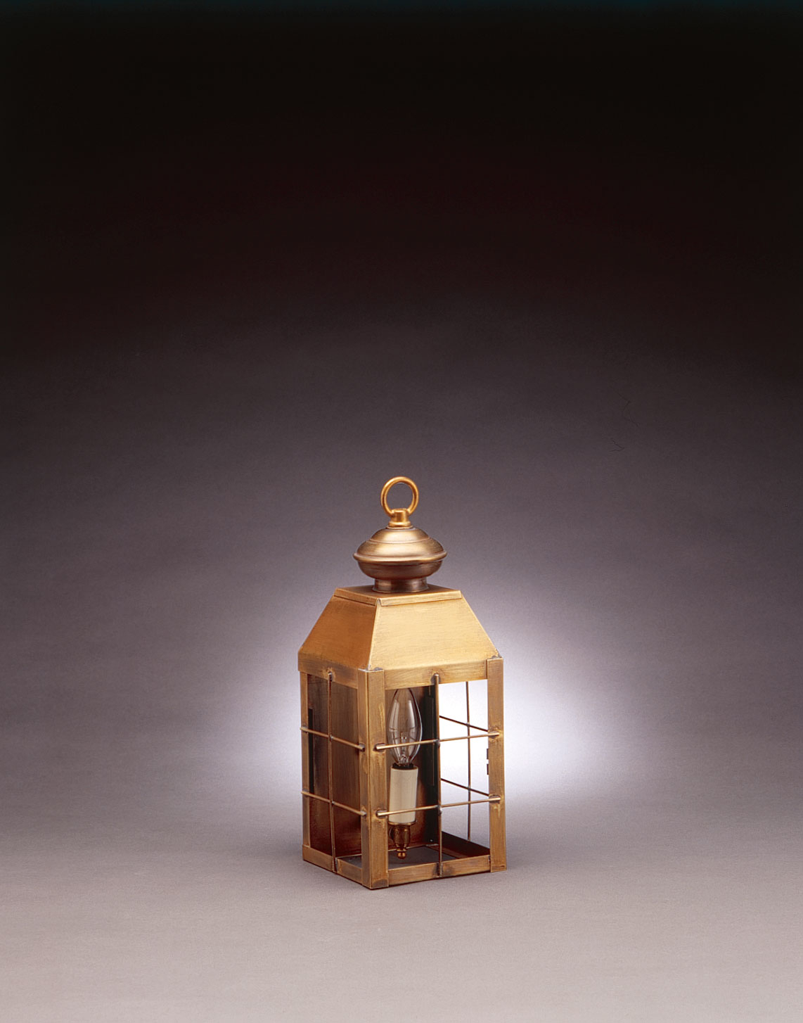 Northeast Lantern Woodcliffe One Light Wall Mount in Antique Brass - 8311-AB-LT1-CLR