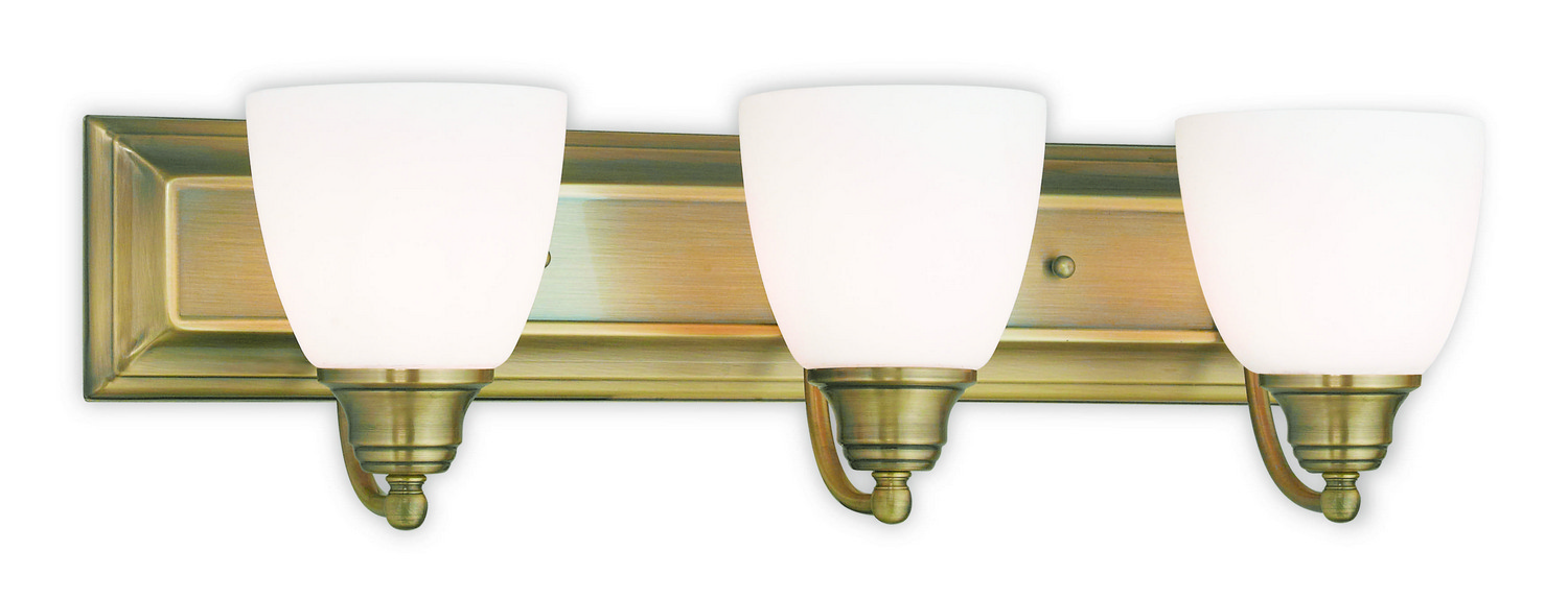 Photos - Chandelier / Lamp Livex Antique Brass Three Light Bath Vanity from the Springfield Collection 10503-01