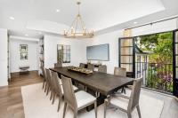 Eight Light Chandelier by Z-Lite - Dennison Collection, Signature Brass Finish - 4005-8SBR